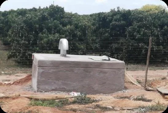 Completed concrete water infrastructure chamber on a rural site